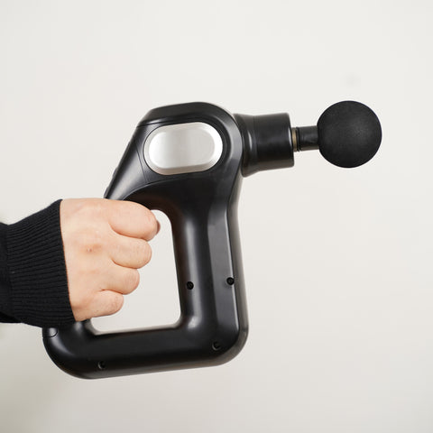 Therapeutic muscle massage gun with 8 heads and 12 speed levels